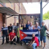 Nach getaner Arbeit - die Cuba sí-Aktivisten vor dem bis unter´s Dach beladenen Soli-Container. 