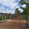 typische Zufahrt zu einem kubanischen Landwirtschaftsbetrieb